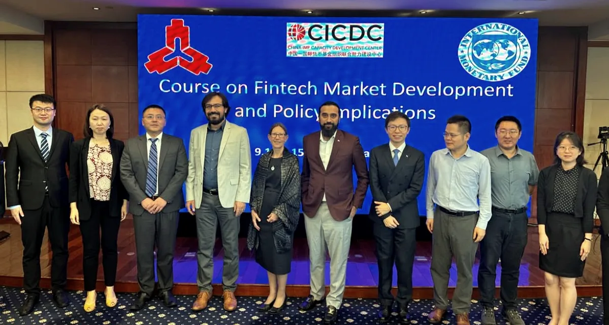 Ahmad Moiz with participants at a fintech market development course
